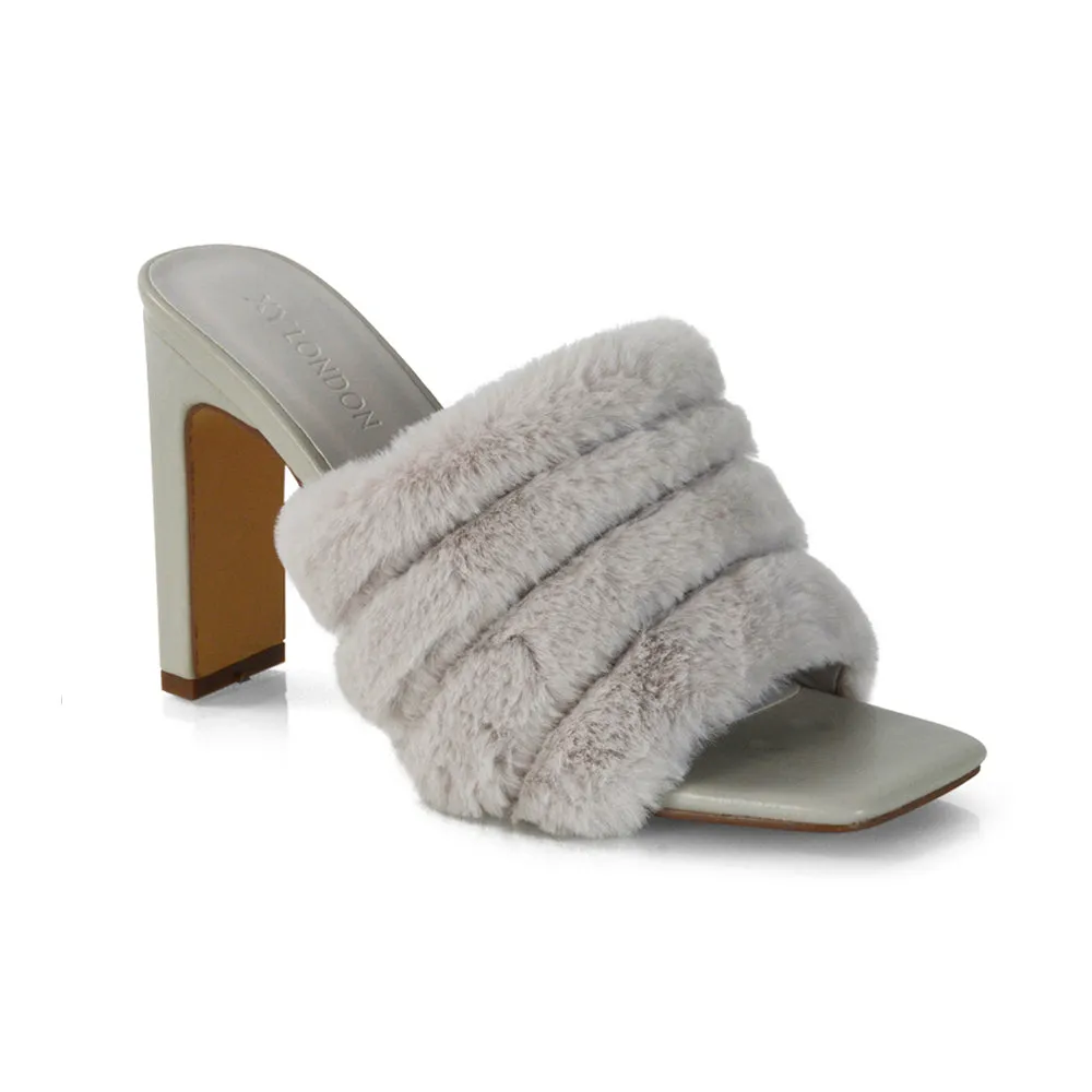 Hunter Fluffy Faux Fur Front Strap Square Toe High Slim Block Heel Mules in Pink