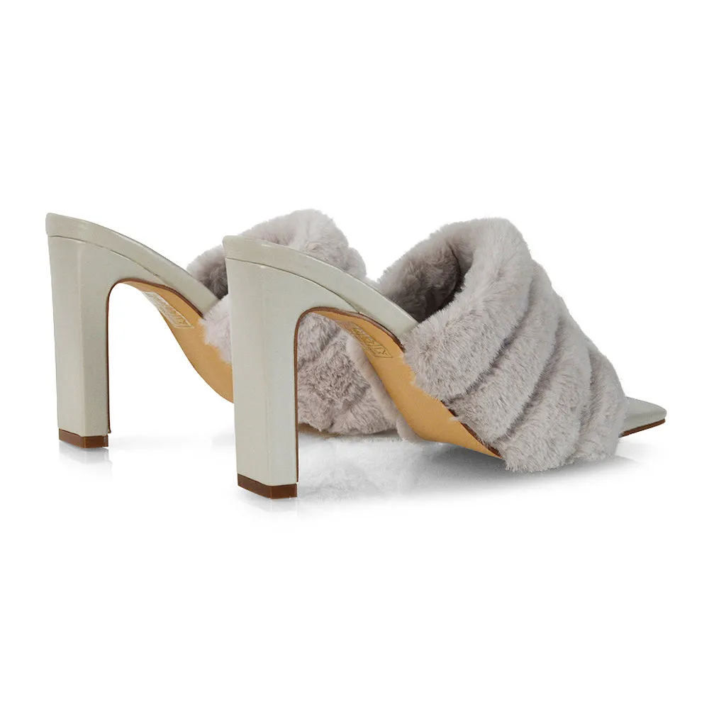 Hunter Fluffy Faux Fur Front Strap Square Toe High Slim Block Heel Mules in Pink