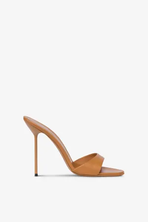 Mules in beige leather