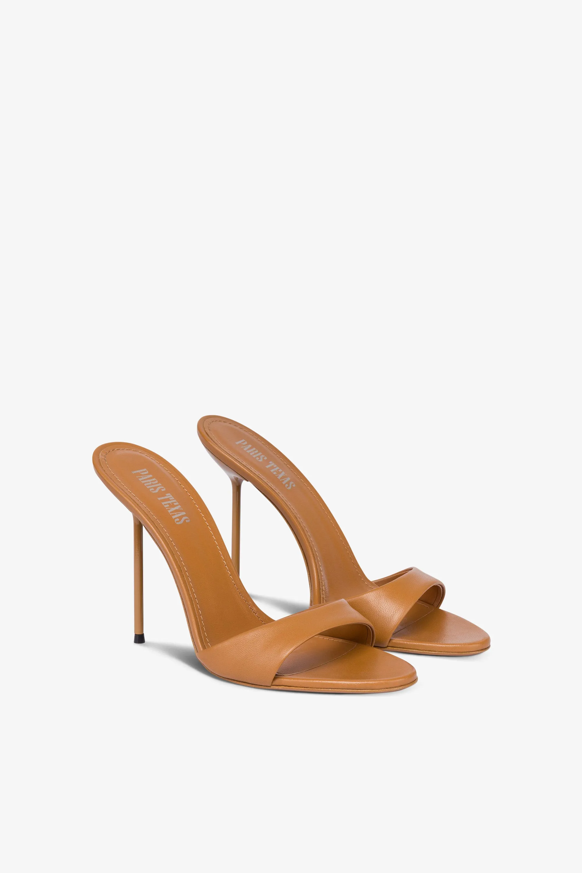 Mules in beige leather